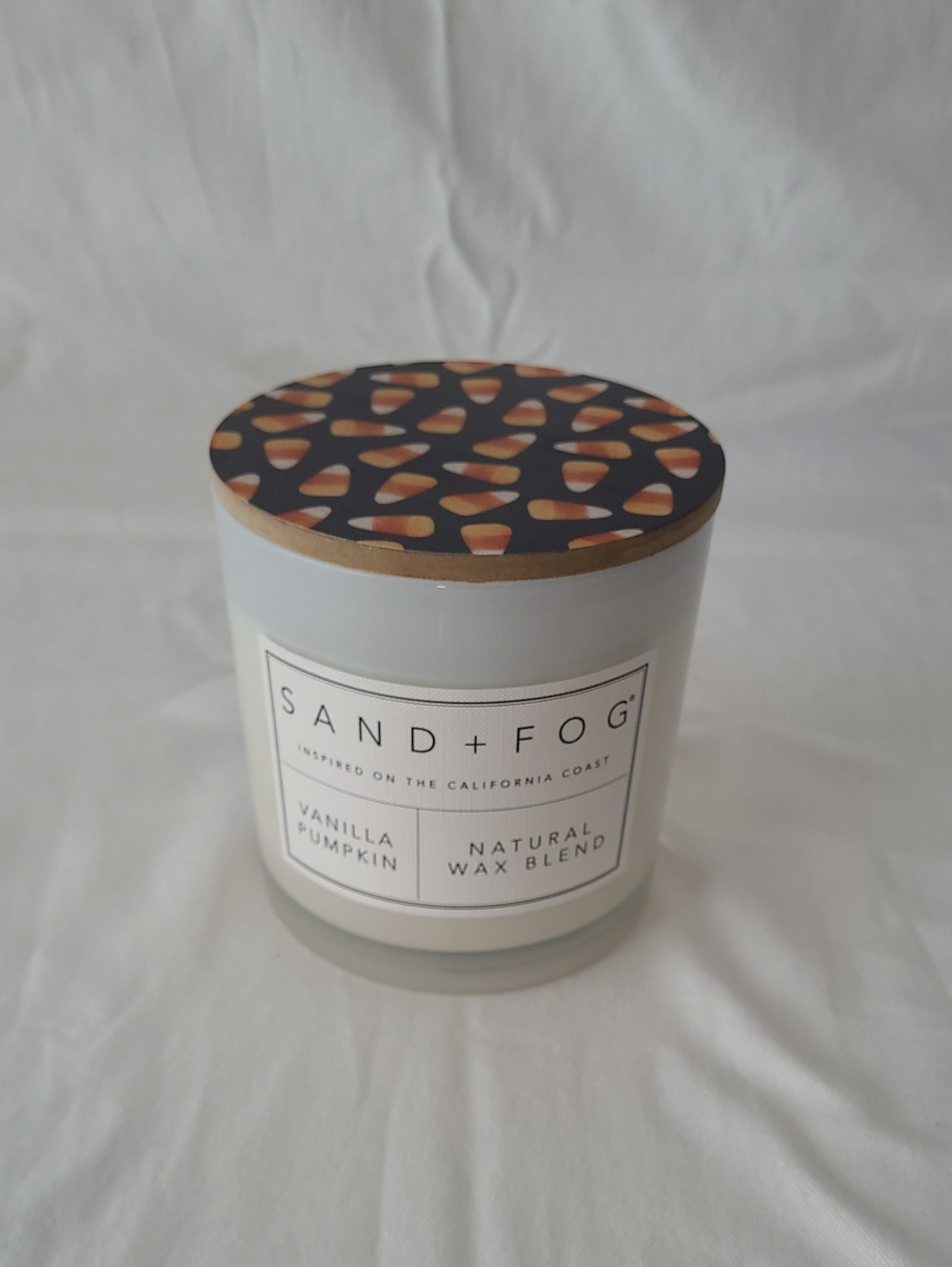 Sand + Fog 21 Oz Vanilla Pumpkin Candle — White with Candy Corn Lid